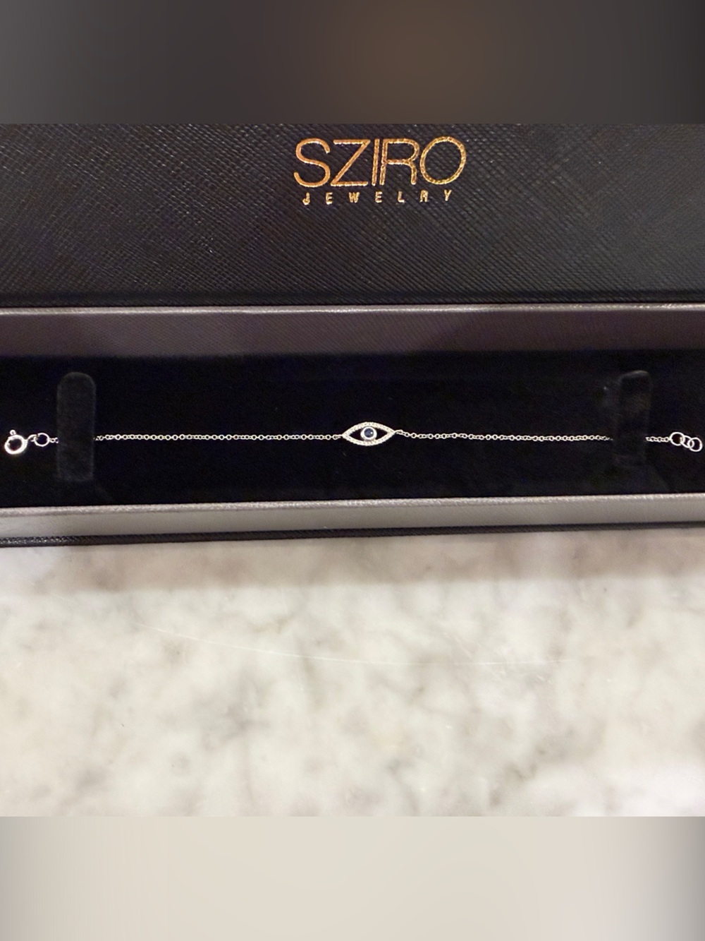 Evil Eye Bracelet 14k solid white gold and diamonds with sapphire